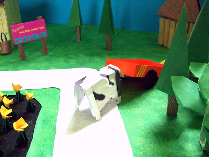 origami cow pushing a kirigami wagon origami cow pushing a kirigami wagon
