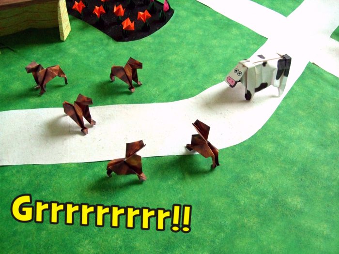 cow looking at mean origami dogs cow looking at mean origami dogs