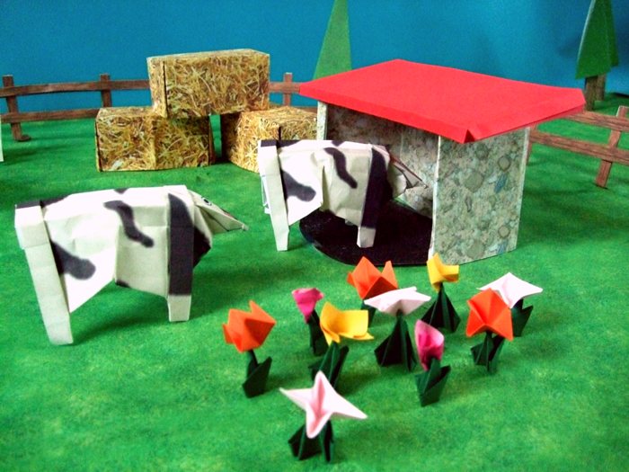 origami cows on the land of a farmer origami cows on the land of a farmer
