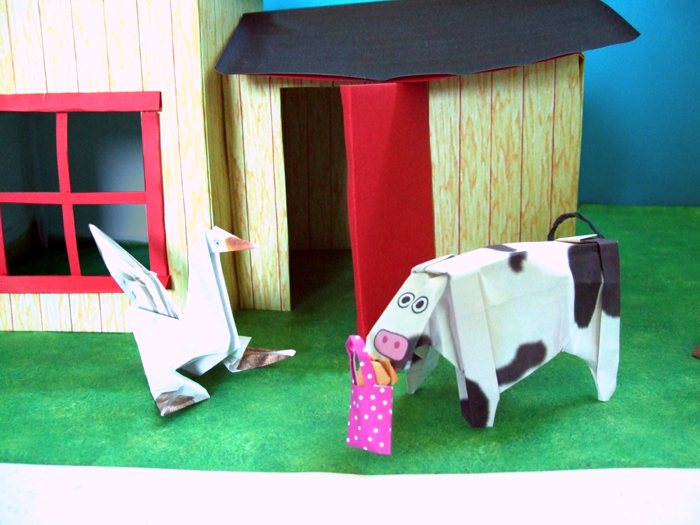 cow with a bag of origami cookies cow with a bag of origami cookies