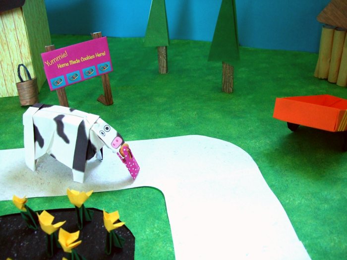 cow with a kirigami bag of origami cookies cow with a kirigami bag of origami cookies