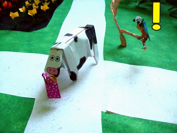 origami parrot shouting at a cow origami parrot shouting at a cow