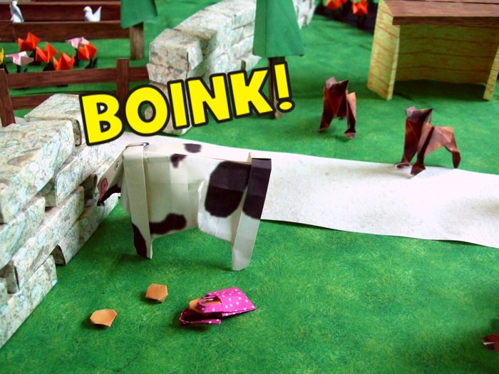 cow running against an origami brick wall cow running against an origami brick wall