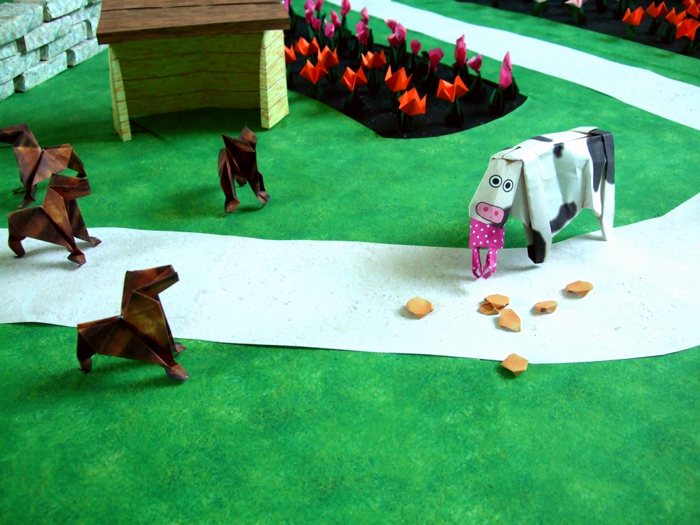 cow emptying a bag with origami cookies cow emptying a bag with origami cookies