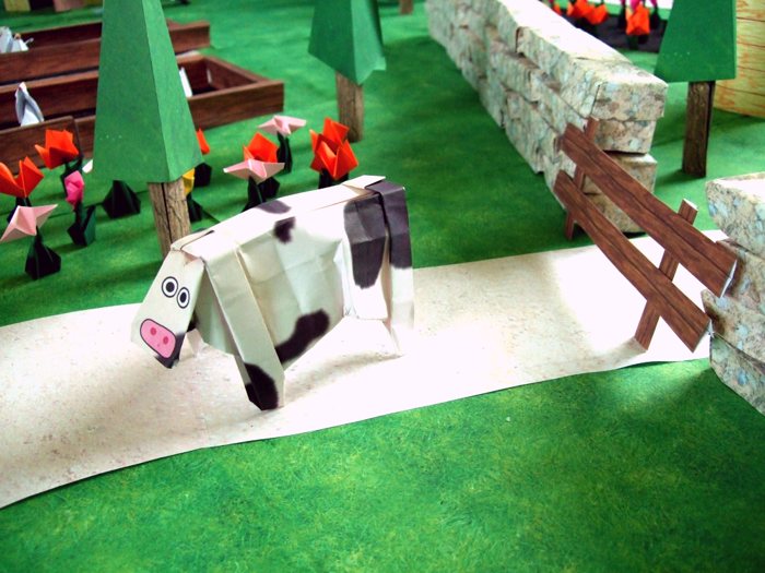 cow walking away from a kirigami fence cow walking away from a kirigami fence