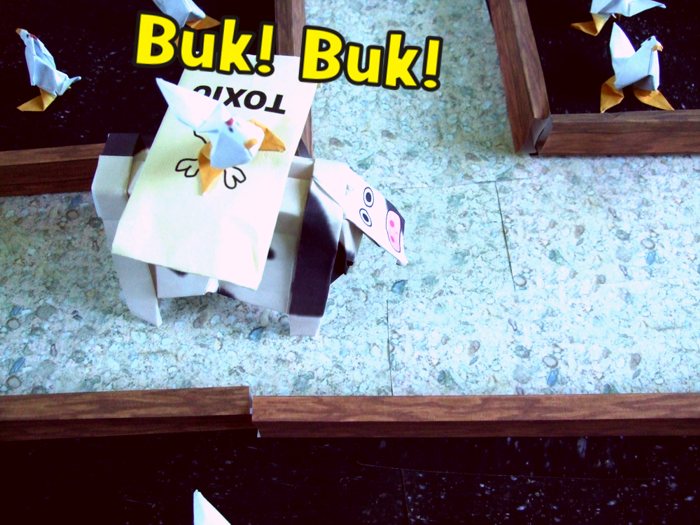 origami chicken standing on the back of a cow origami chicken standing on the back of a cow