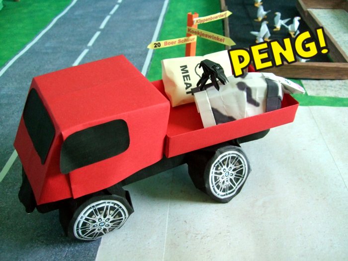 origami spider biting a paper cow origami spider biting a paper cow