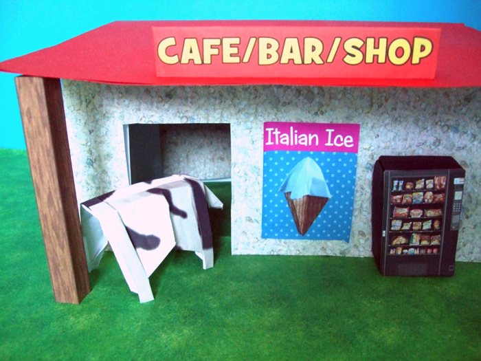 cow looking inside a kirigami road shop cow looking inside a kirigami road shop