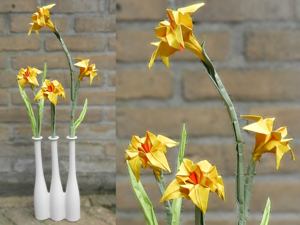 Card with origami narcissus flowers in a pot