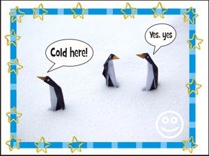 Card with funny origami penguins in real snow Card with funny origami penguins in real snow