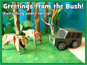 Card with two origami tigers in front of a kirigami jeep Card with two origami tigers in front of a kirigami jeep