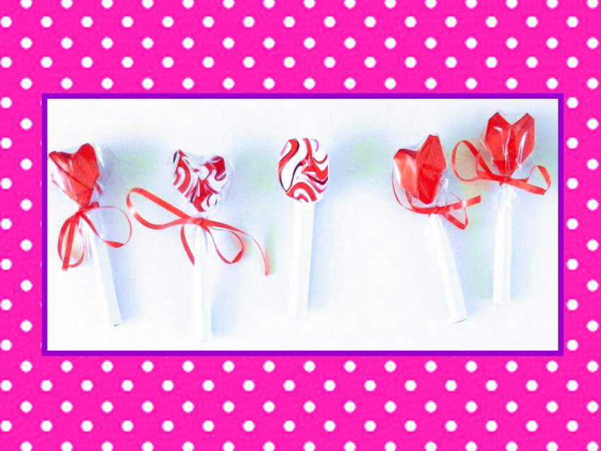 Lollies en een roze polka dot achtergrond