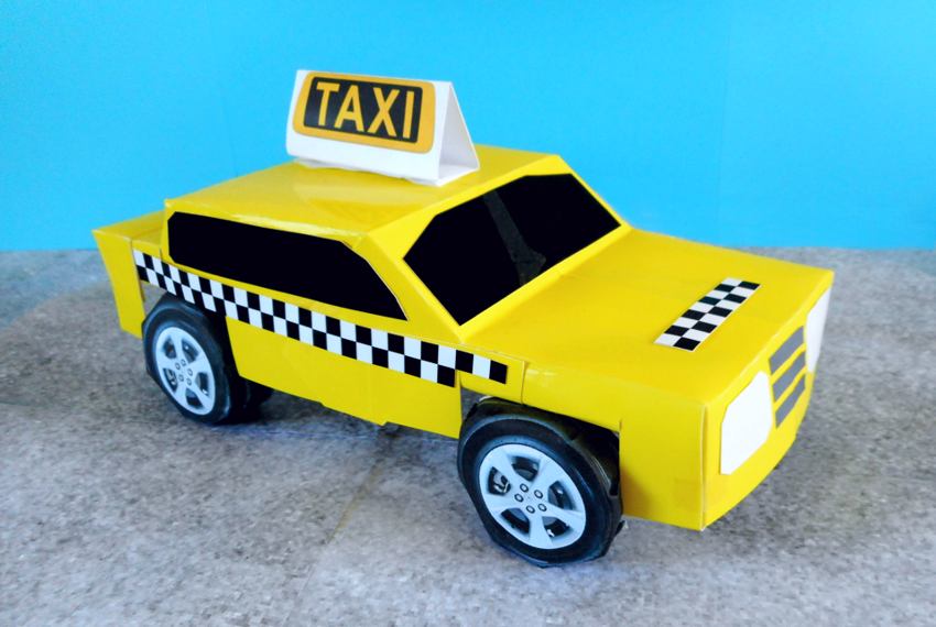 Miniatuur taxi van papier