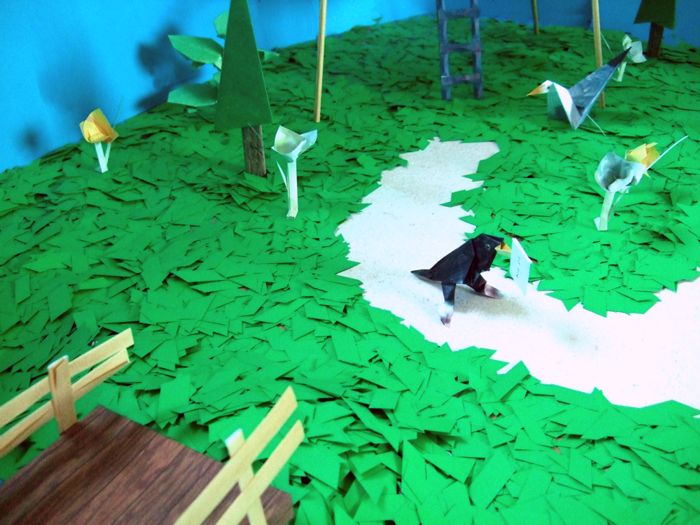 origami bird walking over a path origami bird walking over a path