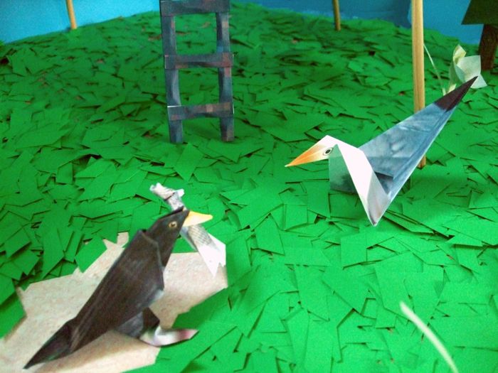 bird talking to an origami gull bird talking to an origami gull