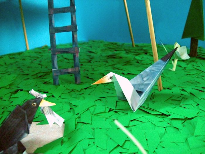 origami gull guarding a kirigami tower origami gull guarding a kirigami tower