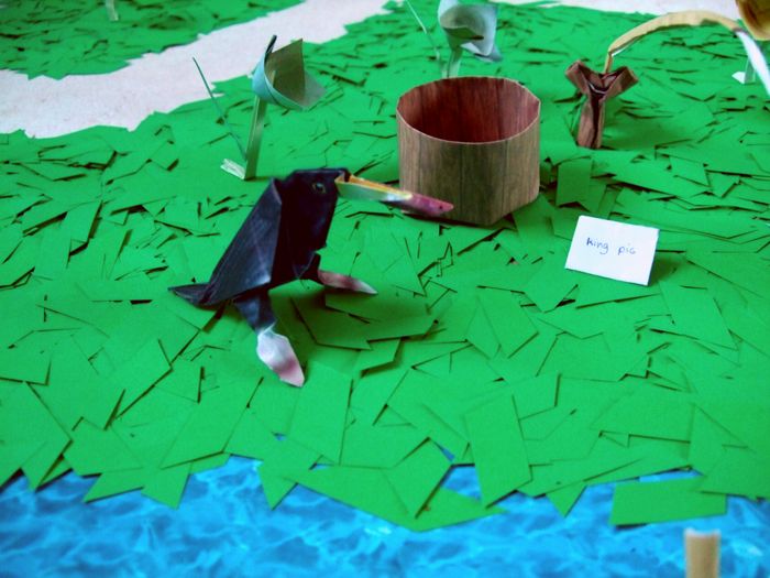 little origami bird eating a worm little origami bird eating a worm