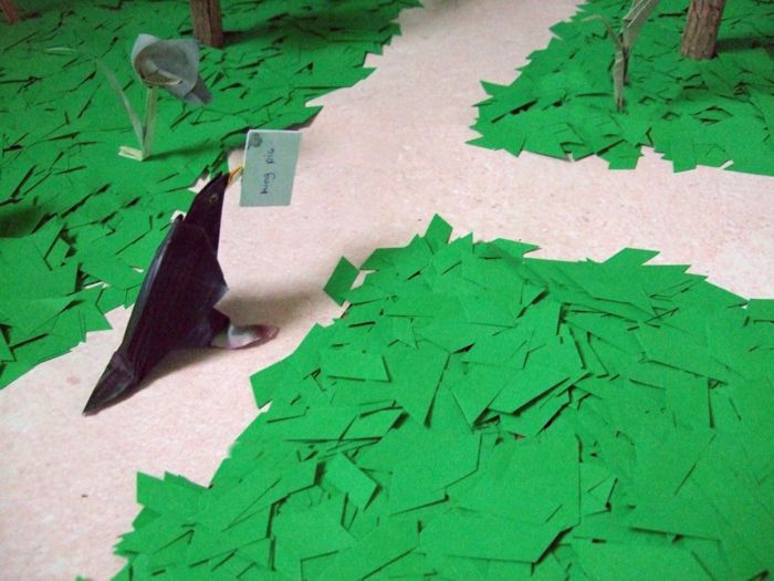 origami bird walking about in the forest origami bird walking about in the forest