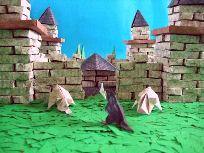 ratten bij een kasteel van papier