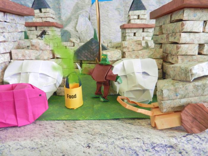 papierkunst stripverhaal bij een kasteel