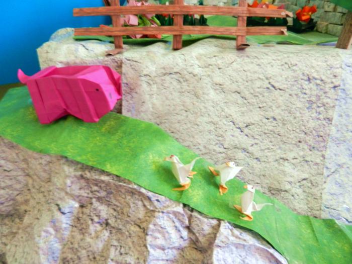 origami boerderij dieren op een bergpad