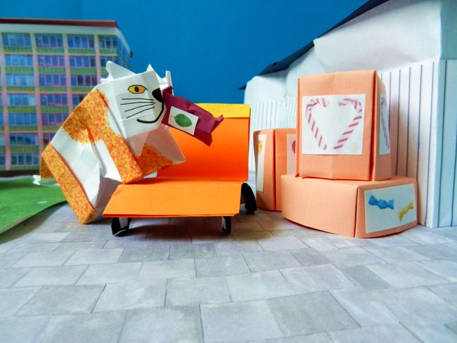 origami cat eating a bag of chips origami cat eating a bag of chips
