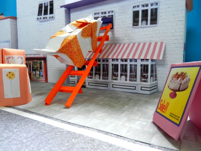 dikke stripfiguur poes op een ladder naar een open raam dikke stripfiguur poes op een ladder naar een open raam