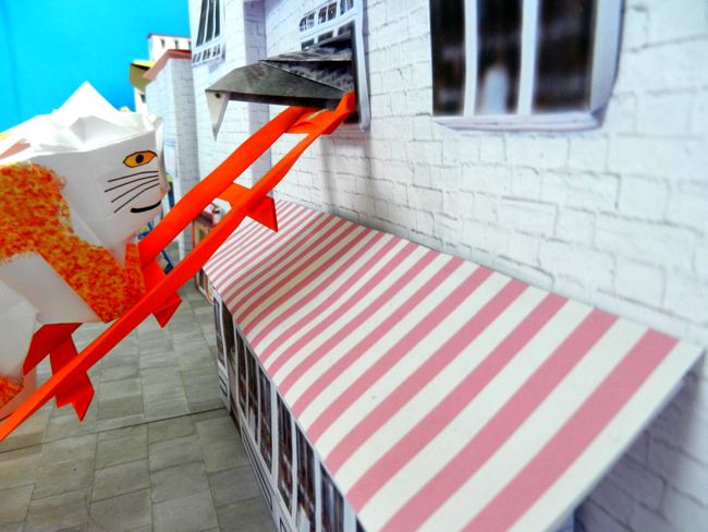stripfiguur poes die met een duif staat te praten stripfiguur poes die met een duif staat te praten
