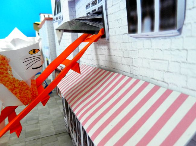 papierkunst duif die tegen een poes staat te praten papierkunst duif die tegen een poes staat te praten