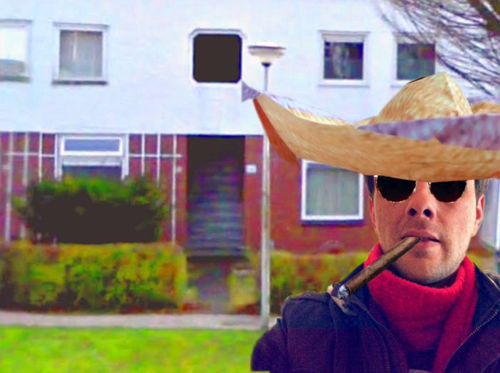 Man with large origami sombrero