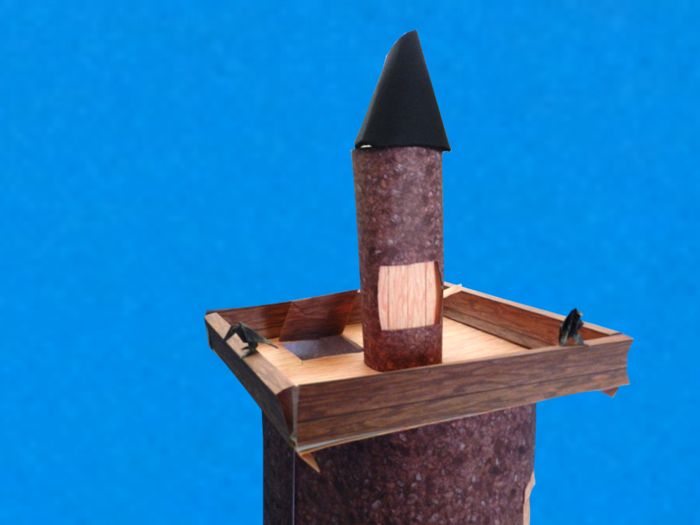 bovenste stuk van een hoge papieren toren bovenste stuk van een hoge papieren toren