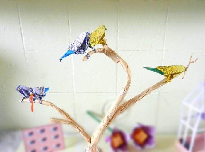 Parakeets on a branch